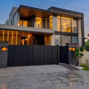 Ultra-Modern Matte Charcoal Black Vertical Slat Sliding Main Gate with Integrated Pedestrian Door