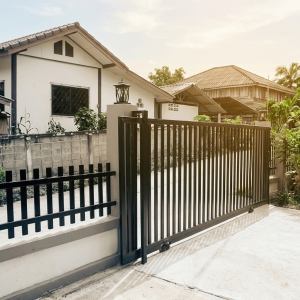 Ultra-Modern Matte Black Metal Sliding Main Gate with Vertical Slats and Minimalist Open Frame Design