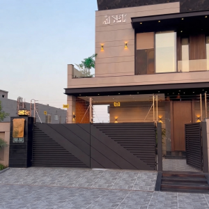 Modern Dark Bronze Geometric Main Gate with Matching Pedestrian Gate
